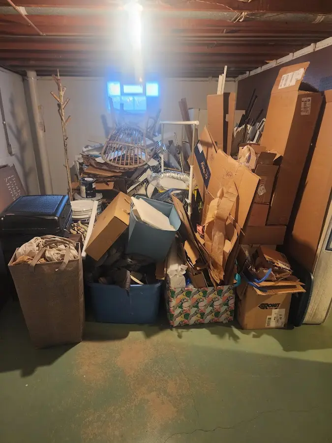 Roll-off dumpster container at job site for Cleanout Dumpster Rental in Watseka